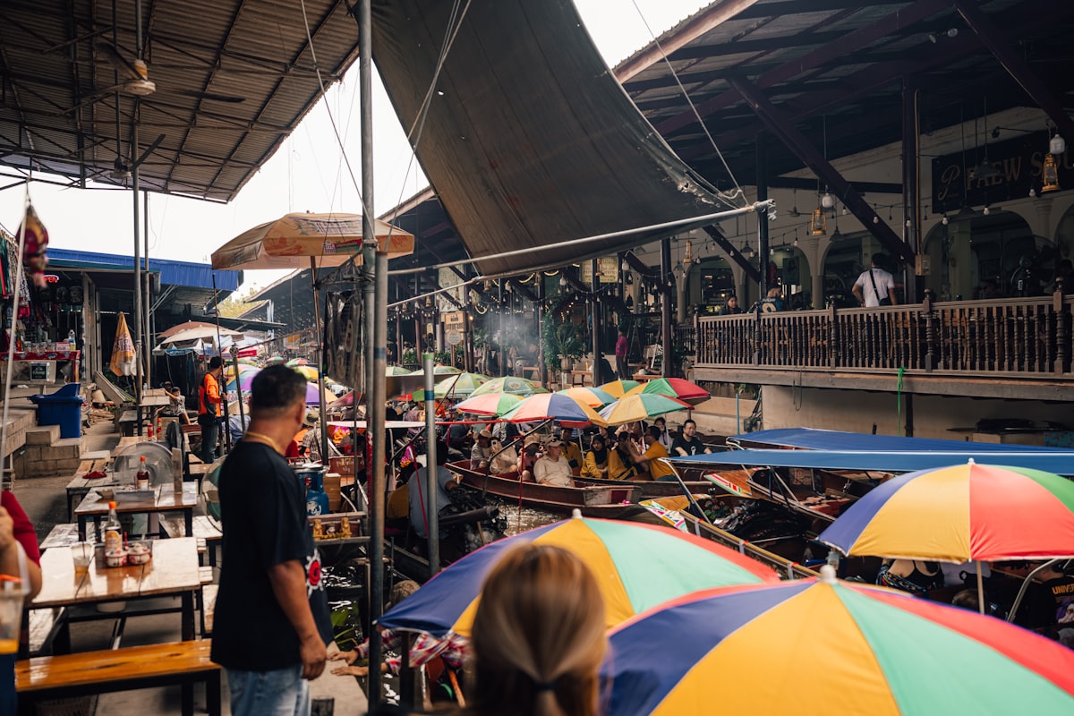 Boats and umbrellas at a Thai canal market